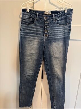 High-Rise Button-Fly Skinny Jeans in Faded Blue
